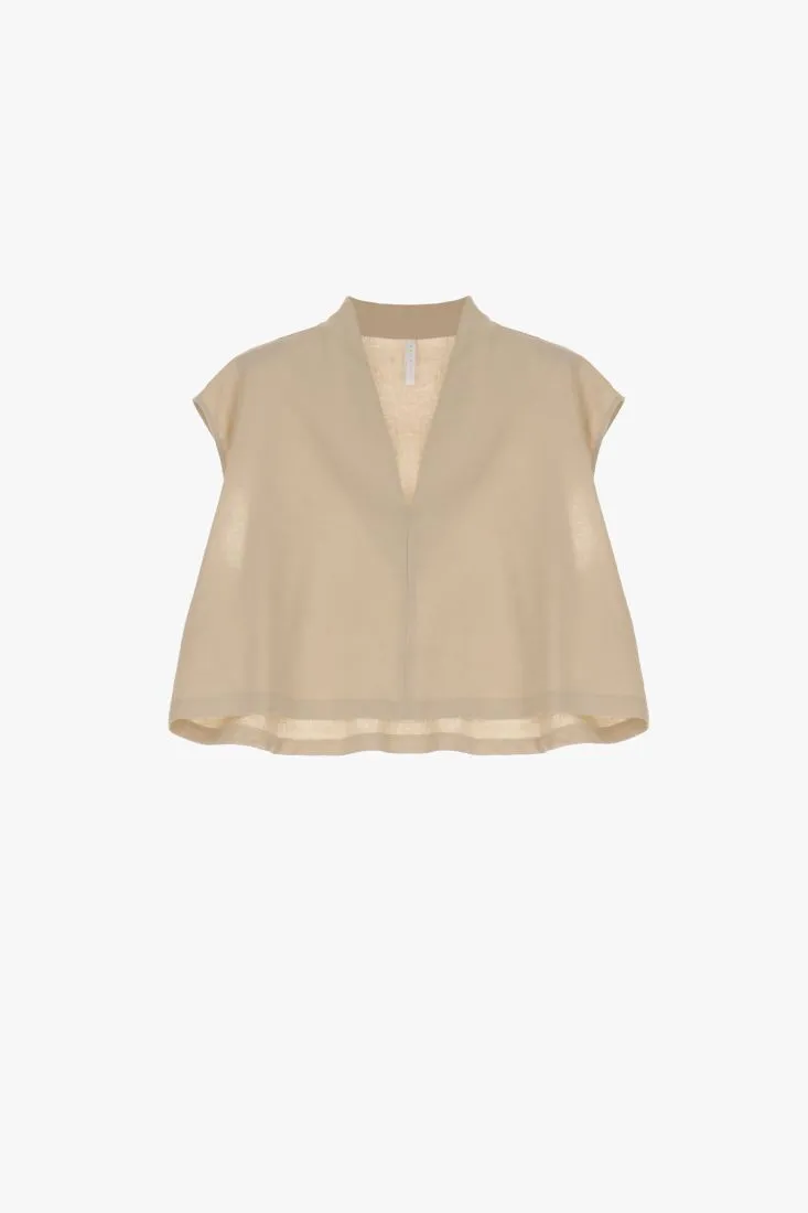 Camicia cropped monocolour con maniche ad aletta