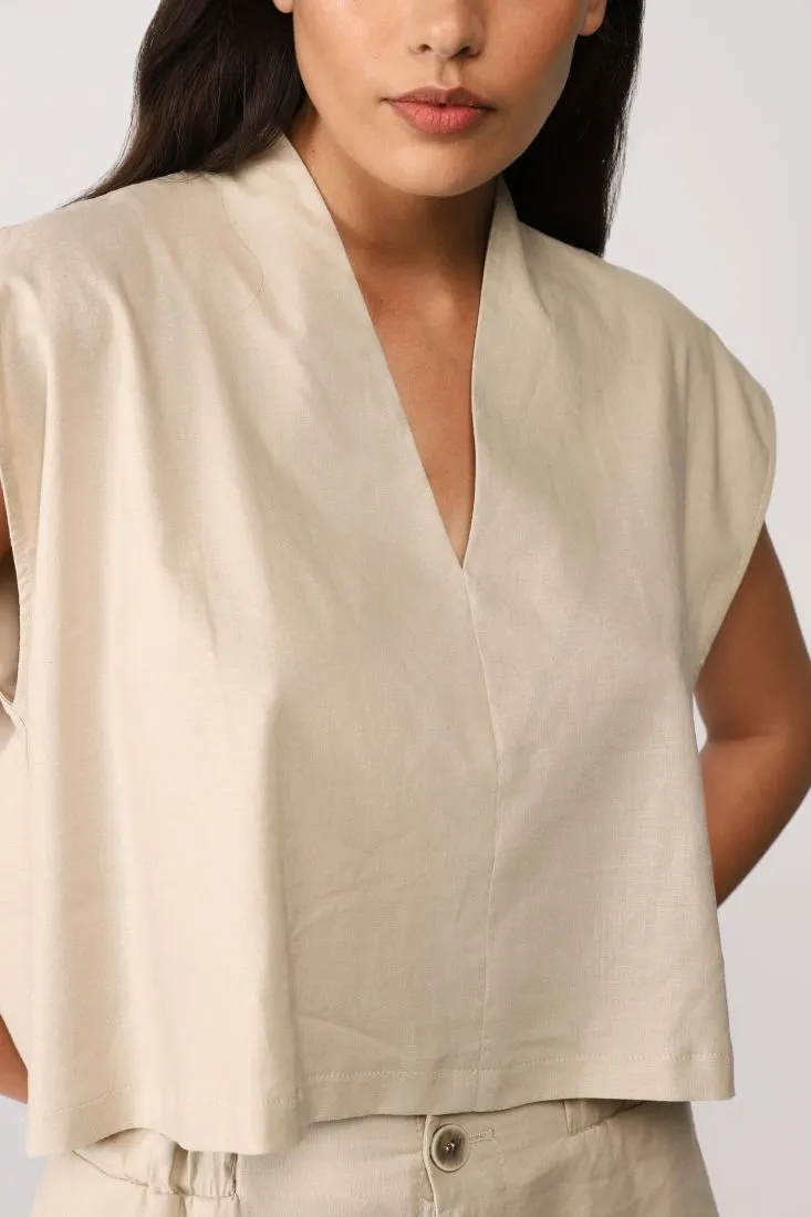 Camicia cropped monocolour con maniche ad aletta