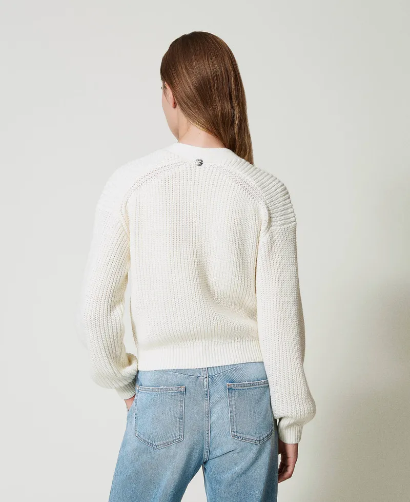 Cardigan con ricami fatti a mano