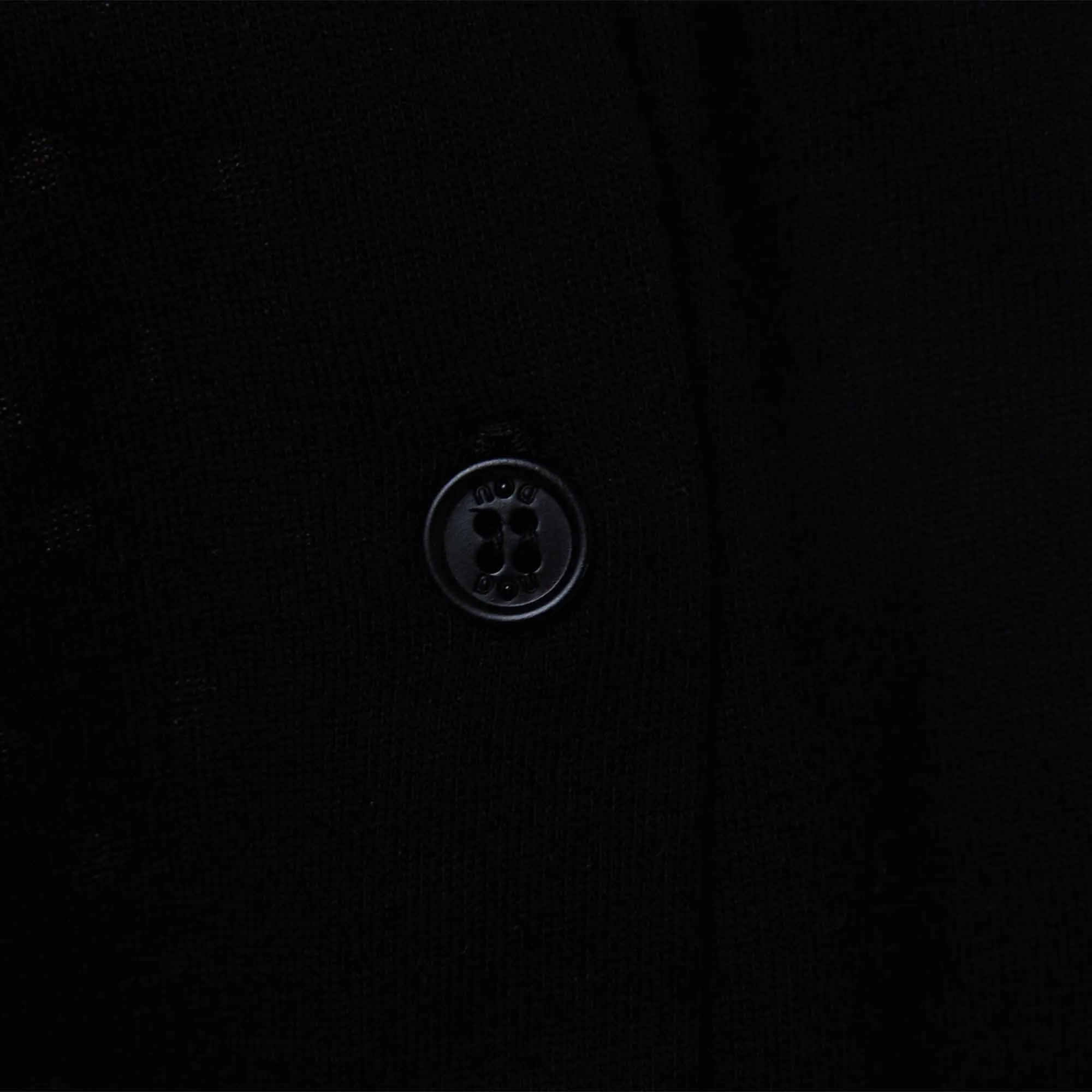Cardigan Nero Con Fori Ricamati Sulla Schiena