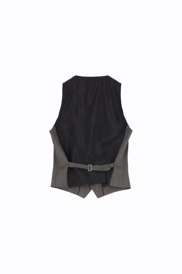 Gilet a righe con tasche a filetto