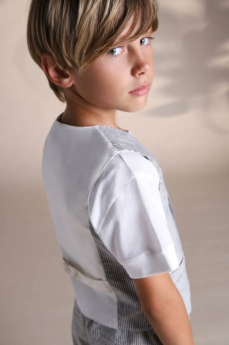 Gilet bambino a righe con taschini a filetto