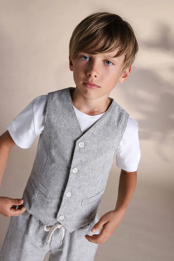 Gilet bambino a righe con taschini a filetto