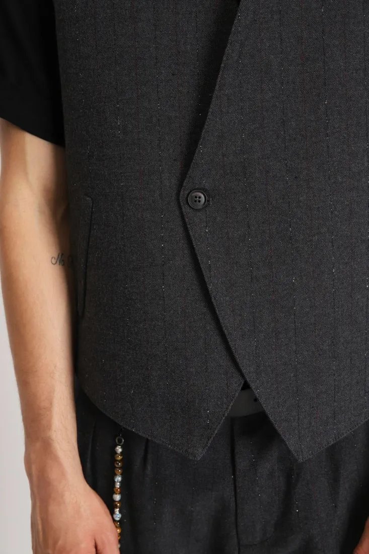 Gilet con chiusura asimmetrica