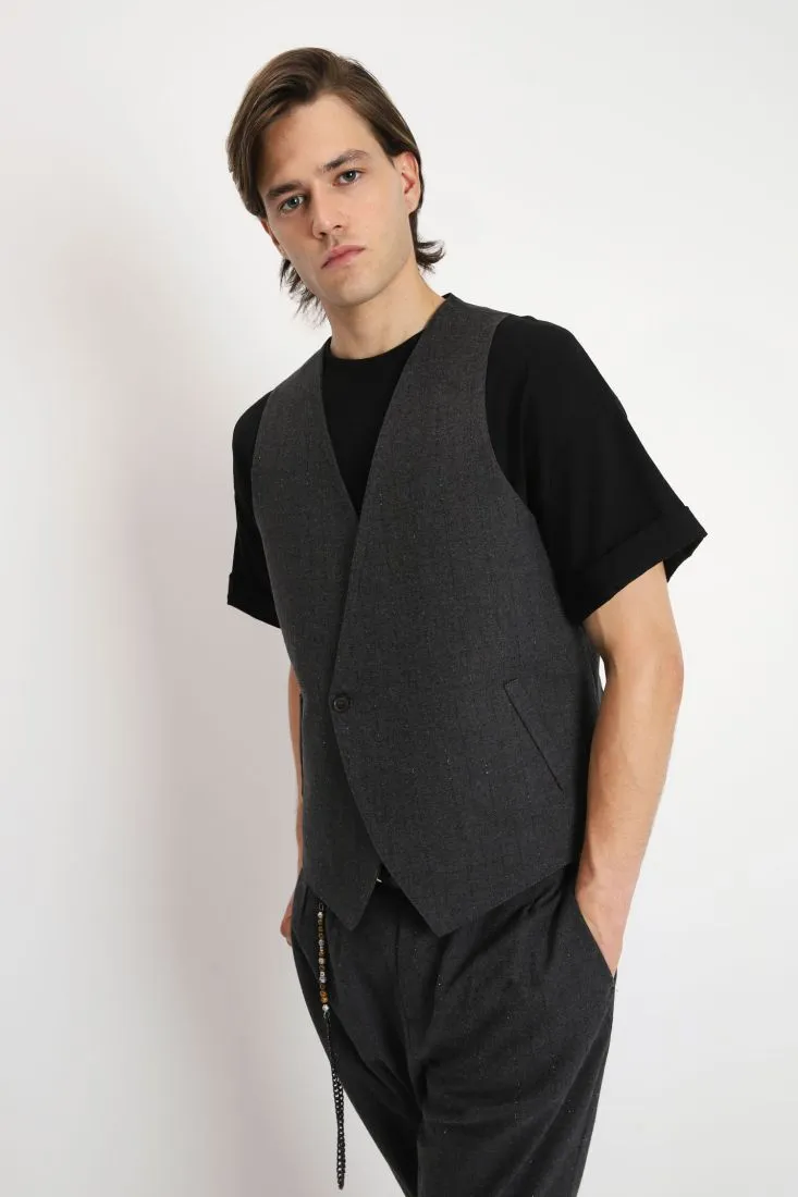 Gilet con chiusura asimmetrica