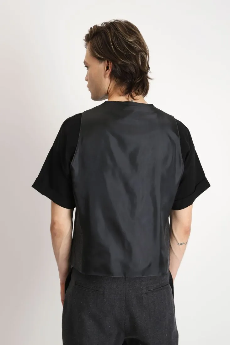 Gilet con chiusura asimmetrica