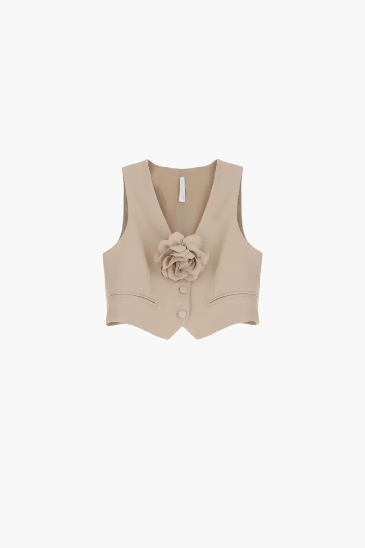 Gilet monopetto cropped con fiore applicato