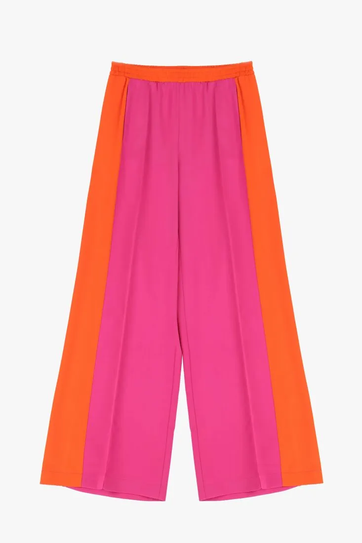 Pantaloni a palazzo fantasia bicolor con piega stirata