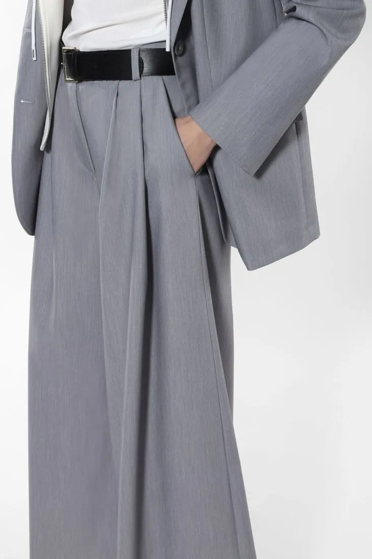 Pantaloni a palazzo fantasia mélange con piega stirata