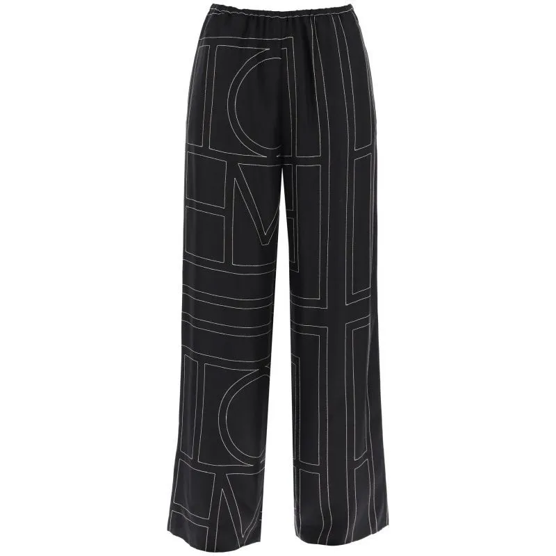 Pantaloni in seta ricamo monogram