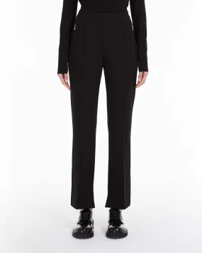 Pantaloni neri in jersey in misto viscosa punto Milano con nervatura fronte e retro