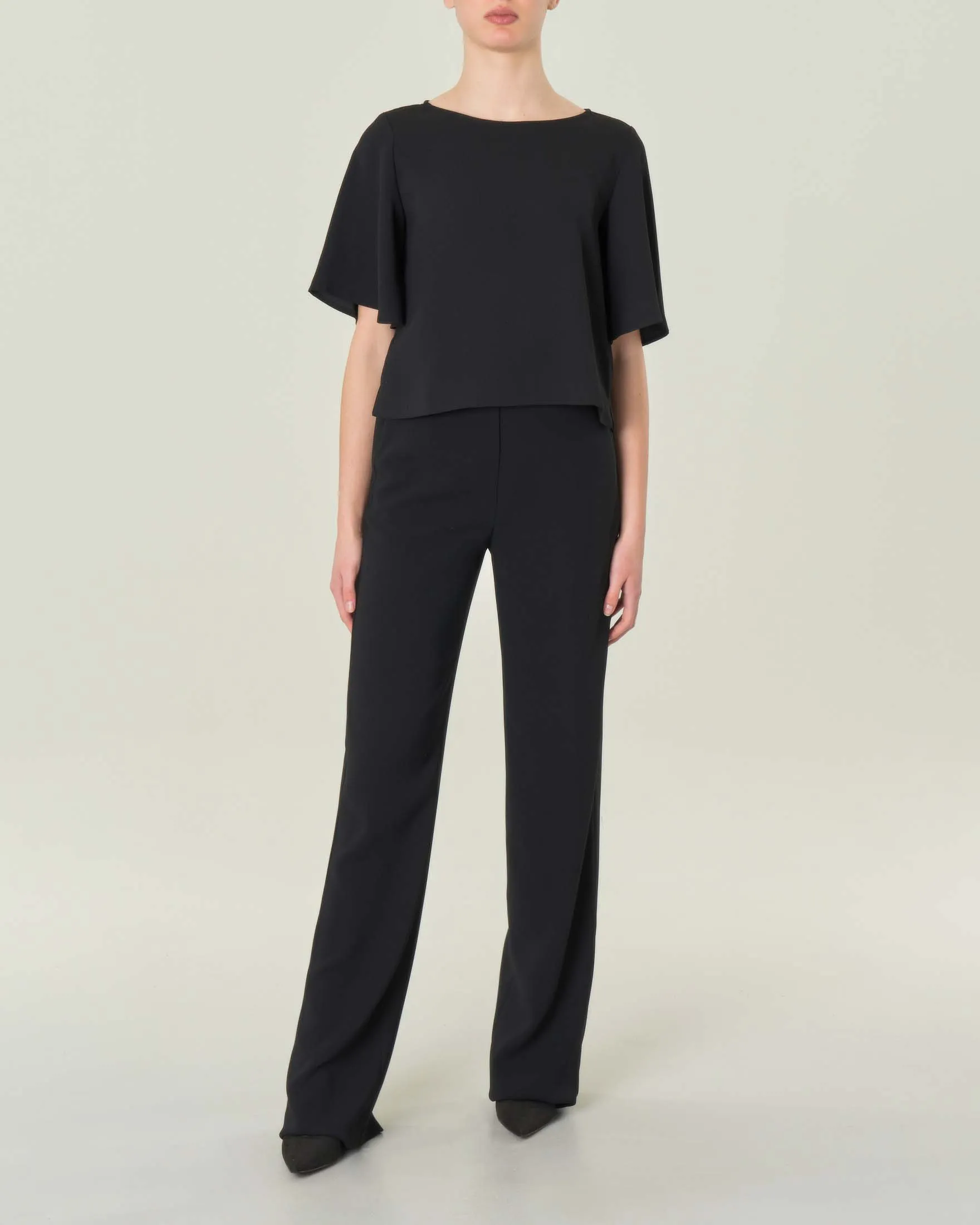 Pantaloni palazzo neri in cadi con elastico inserito in vita sul retro
