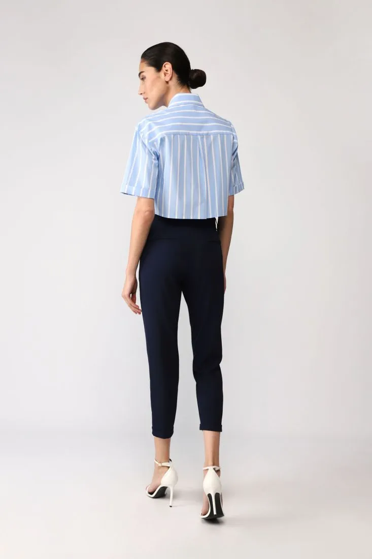 Pantaloni slim-fit cropped con vita alta e tasche verticali
