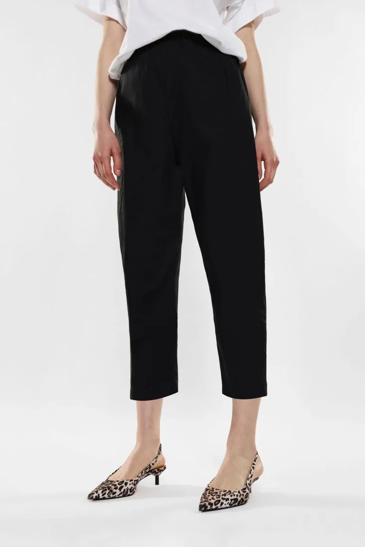 Pantaloni slim-fit cropped in puro cotone con tasche verticali