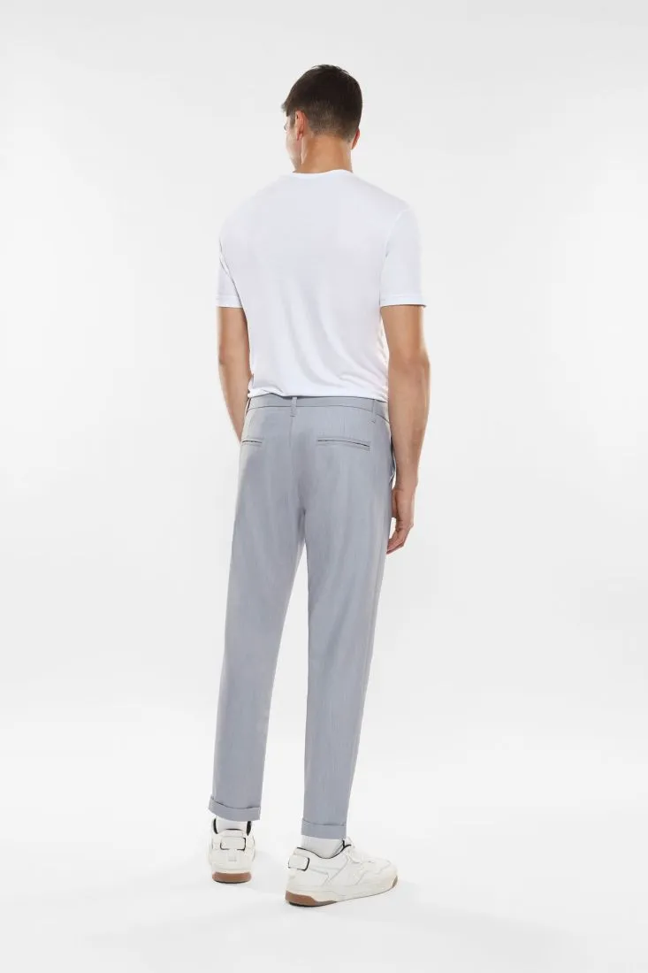 Pantaloni slim-fit effetto denim con tasche verticali