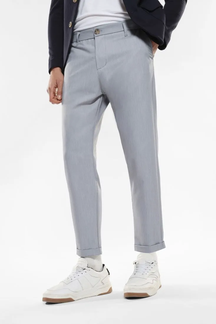 Pantaloni slim-fit effetto denim con tasche verticali