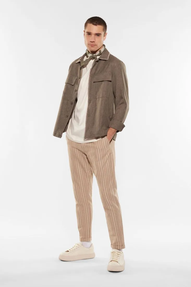 Pantaloni slim-fit fantasia gessata con tasche verticali