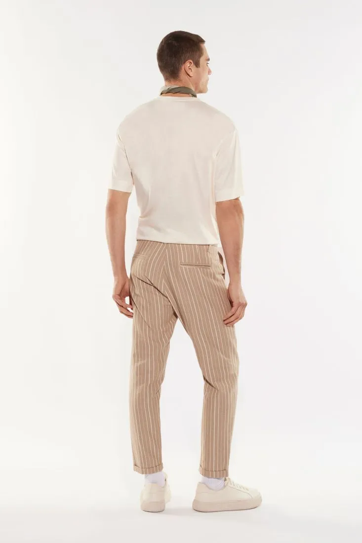 Pantaloni slim-fit fantasia gessata con tasche verticali