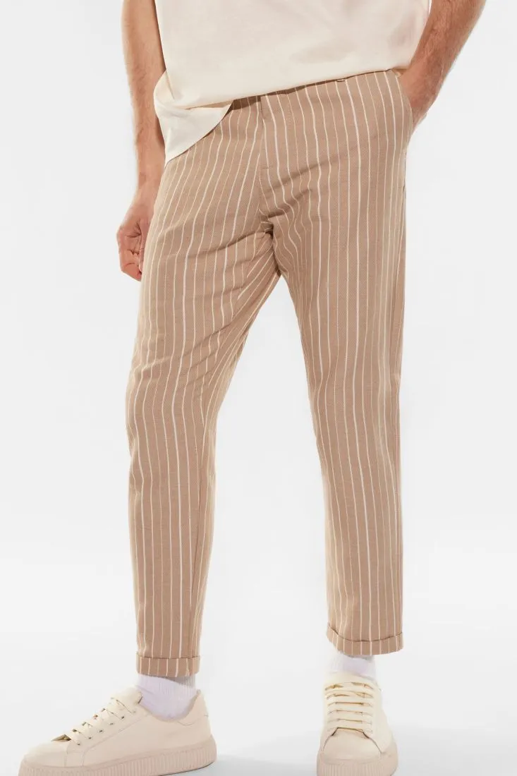 Pantaloni slim-fit fantasia gessata con tasche verticali