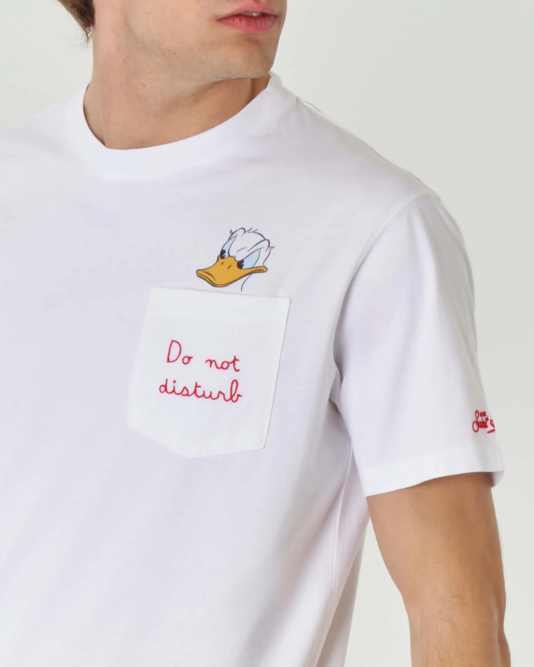 T-shirt bianca mezza manica in cotone con taschino e stampa Paperino sul petto